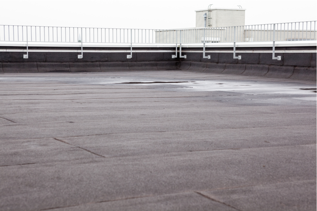 Flat Top Roof Coating vs Replacement